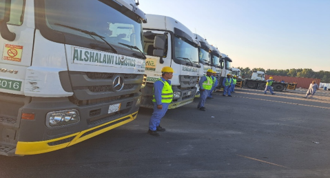 Truck line-up with drivers