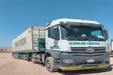 Container haulage between ports and sites